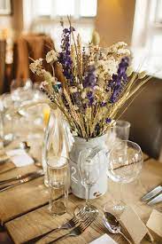 The variety of colors in this bouquet would be beautiful in an autumn arrangement or as wedding bouquets in a rustic themed wedding. 15 Ideas Wedding Dried Flowers Decor Wedding Forward Decor Dried Flowers Dried Flowers Wedding Cheap Wedding Table Centerpieces Wedding Table Centerpieces