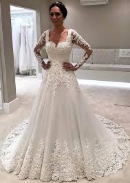 (think princess diana's gown which looks dated because of puffy. Elegant Long Sleeve Lace Wedding Dresses Illusion Sexy Bride Dresses With Long Train Suzhoudress Co Uk