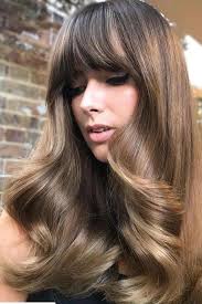 These Haircuts Are Going To Be Huge In 2020 Brushed Out Curls Long Hair With Bangs Hairstyles With Bangs