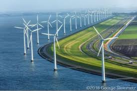 Photo By George Steinmetz Much Of Holland Is An Engineered Landscape And It S Most Visible In Places Like Fle Con Immagini Turbina Eolica Energie Rinnovabili Paesi Bassi