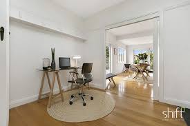 Home Office Trestle Table Desk Round Jute Rug Open Plan Living With Timber Floors Guest Room Decor Home Open Plan Living