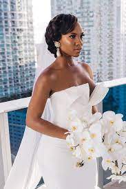 39 Black Women Wedding Hairstyles That Full Of Style Black Brides Hairstyles Munaluchi Bride Black Wedding Hairstyles