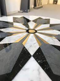 Discover room galleries, buying guides, style tips, and more. Marble Center Table In Carrara Marble With Inlay Design In Brass In 2021 Marble Inlay Floor Inlay Flooring Marble Inlay Designs