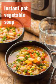 This Instant Pot Vegetable Soup Is So Comforting And Super Easy To Make Loaded With Potatoes Corn Peas Vegetable Soup Recipes Veg Soup Vegan Vegetable Soup