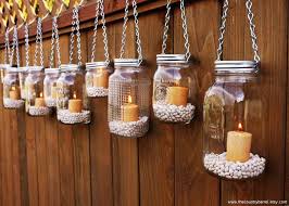 Natural Lighting Ideas For Your Outdoor Entertainment Area With Images Mason Jar Garden Hanging Tea Lights Garden Lighting Diy