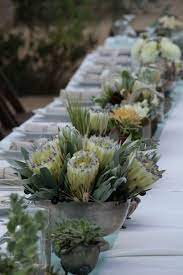 Mystical Magical Tending To It Protea Wedding Flower Arrangements Table Flowers