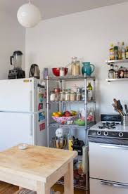 Here are ten ideas to save space in your small dining room. 40 Best Small Kitchen Design Ideas Decorating Tiny Apartment Kitchen Pictures Apartment Therapy