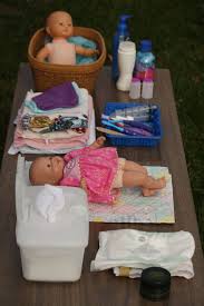 In an infant/toddler center, a hammock invites a caregiver to cuddle one or two babies. Doll Diaper Station Happy Hooligans Dramatic Play Preschool Dramatic Play Area Dramatic Play Centers