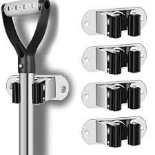 We have various holders designed for wall mounting or free standing. Buy Mop And Broom Holder Wall Mount Heavy Duty Stainless Steel Broom Holder Wall Mounted Broom Organizer Home Garden Garage Storage Rack Silver Online In Turkey B08mzpk5l3