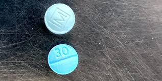 White and green pill capsule with drop of cbd oil and green leafs of cannabis on white. Medical Examiner Mid Year Statistics Show Jump In Fentanyl Deaths News San Diego County News Center