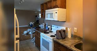 Integrated lighting brings the focus to the center island. Tiny Kitchen Remodel Project By Amelia At Menards