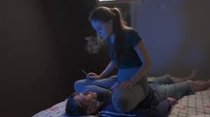 Princess Ava sits on the slaves chest and spits in the face