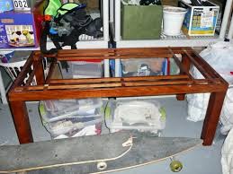 Coffee table using an old door. How To Repurpose A Door Into A Coffee Table How Tos Diy