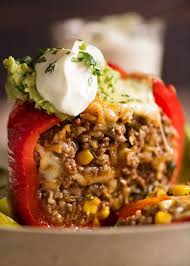 It consists of hollowed or halved peppers filled with any of a variety of fillings, often including meat, vegetables, cheese, rice, or sauce. Mexican Stuffed Peppers Recipetin Eats