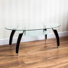 You can choose a simple table that's basically four legs and a tabletop, and that's just fine for many people. Vida Designs Elena Black And Clear Glass Coffee Table Buy Online In Andorra At Andorra Desertcart Com Productid 49999263