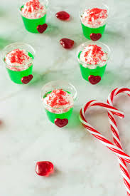 These Grinch Jello Shots Are The Perfect Way To Say Cheers To The Holidays Made With Vodka Lime Green Christmas Recipes Easy Jello Shots Jello Shot Recipes
