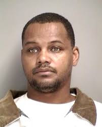 Police searching for "armed and dangerous" probationer who cut off tracking  device