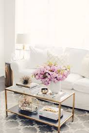 Chic White Sofa Living Room With Gold Coffee Table And Accents Living Room Table Coffe Table Decor Living Room Coffee Table