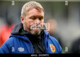 Grant McCann manager of Hull City gives instructions to substitute Andy  Cannon #14 of Hull City before he goes