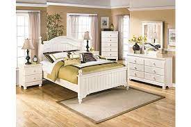 The Cottage Retreat Poster Bedroom Set From Ashley Furniture Homestore Afhs Com The Cot Rooms To Go Bedroom Cheap Bedroom Furniture Cream Bedroom Furniture