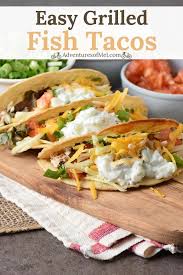 This simple taco bar features firm, mild fish (such as tilapia) that's been coated in crushed corn chips and baked in the oven for an irresistible crunch. Easy Simple Delicious Crispy Fish Tacos Recipe With A Creamy Tzatziki Fish Taco Sauce Your Family Will Love Yo Mexican Food Recipes Seafood Recipes Recipes