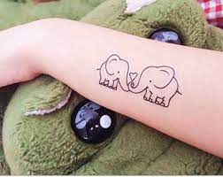 Https Www Google Ca Search Q Elephant 20couples 20tattoos Espv 2 Biw 1920 Bih 955 Tbm Isch Tbo Elephant Tattoo Small Tattoos For Daughters Small Girl Tattoos