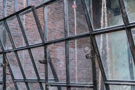Maybe you would like to learn more about one of these? Vintage Industrial Style Flipping Steel Windows Interior With Brick Background And Haning Ropes Stock Photo Picture And Royalty Free Image Image 119841908