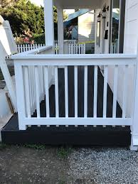 Keep in mind, if this deck had anything to do with the curb appeal at the front of the house, it would most likely not be this colour. Front Home Finish With White Rail Painted Including A Black Stained Deck Modern San Francisco By Aiden S Quality Painting Houzz