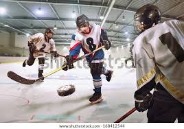 Hockey Player Shoots Puck Attacks Stock Photo Edit Now 168412544