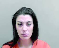 Woman Remains In Jail