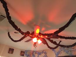 Trash Bags Rope Ceiling Fan And Red Light Bulb Make The Mind Flayer Stranger Things Halloween Stranger Things Christmas Stranger Things Halloween Party