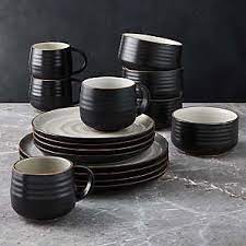 Each piece has a different design, and the coupe shapes layer for a casual, contemporary look that's great for everyday and entertaining. Black And White Dinnerware Crate And Barrel