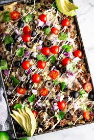 The Best Mexican Beef Nachos Recipe In This Easy Nachos Recipe Seasoned Ground Beef Is Nestled Betw Nachos Recipe Beef Mexican Food Recipes Best Nacho Recipe