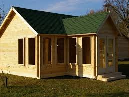 Large Garden Building Log Cabin With Plain Wood And Green Shingles On The Roof Residential Log Cabins Log Cabin Cabin