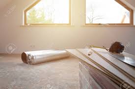 Check spelling or type a new query. Construction Worker Installing Laminate Floor In A New Renovated Attic Home Improvement Concept Stock Photo Picture And Royalty Free Image Image 147276150