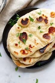 Vegan Naan Recipe Easy To Make At Home Indian Style Naan Bread Bakes Up Soft Fluffy And Delicious Perf In 2020 Vegan Naan Indian Food Recipes Vegan Indian Recipes