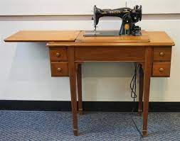 Maybe you would like to learn more about one of these? Lot Singer Sewing Machine Cabinet