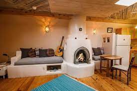 Pueblo Style Tiny Home In Santa Fe With A Mind Blowing Interior Tiny House Living Room Tiny House Cabin Tiny House Towns