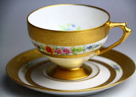 Striking japan lusterware tea cup and saucer set, lavender on a white ground with floral bouquet. Our Antique Teacup Collection Ginza Gomei Akita Beef Teppanyaki