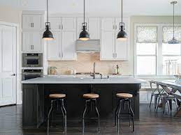 While a classic tuxedo kitchen typically has white upper cabinets and black lower cabinets, flip the design upside down and opt for oversized cabinets that double as a chalkboard. 8 Stylish Tuxedo Kitchen Designs Hgtv