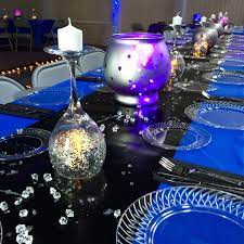 Decorate your dining table for the holidays with some simple decor ideas. Galaxy Table Decorations For The Written In The Stars Formal Theme Dropsofdesign Galaxy Wedding Prom Theme Decorations Table Decorations