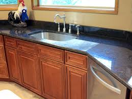 Countertops for kitchens and bathrooms by the guys with the unlimited guarantee. Coffee Brown Granite Granite Countertops Granite Tile