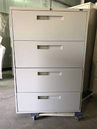 Maybe you would like to learn more about one of these? Global 4 Drawer Lateral Filing Cabinet Center Pull Handles Beige Newmarket Office Furniture