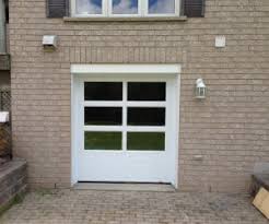 A basement entrance gets new life basement doors how to install basement windows and basement doors cleargress door basement entrancemoving a door in the basement her tool beltmoving a door in the basement her tool beltour home from scratchhelp floor door into basement with gas springs doityourself munity forumsbasement doors continue reading. Transforming A Room In The Basement Into A Garage A 1 Overhead Door Systems