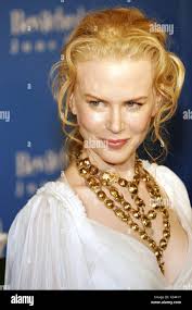 Nicole Kidman (wearing an Yves Saint Laurent dress) at arrivals for  BEWITCHED World Premiere, The Ziegfeld Theatre, New York, NY, June 13,  2005. Photo by: Fernando Leon/Everett Collection Stock Photo