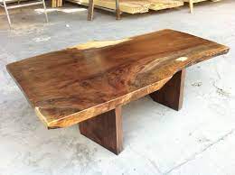 Vintage coffee table, there is a lip to hold the (safety glass) it makes a striking piece of furniture. Walnut Live Edge Coffee Table Stump Furniture
