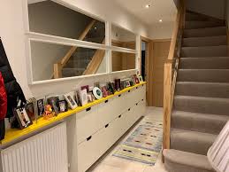 Years ago i bought the shoe cabinet below to in an attempt to keep them organized. Hide The Hallway Mess With Stall Shoe Storage Units Ikea Hackers