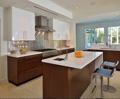 The pristine white doors hide some of the appliances, as well as a sizable pantry. Modern Kitchen Ideas Easy Simple Kitchen Design Novocom Top