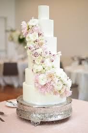 White and blush wedding cake with neutral tone flowers. 28 Trendy Summer Wedding Cakes That Speak To The Season