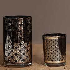 They are made to be hung with a ring on the top of the candle holder. Black Gold Glass Candle Holders Harrod Horticultural